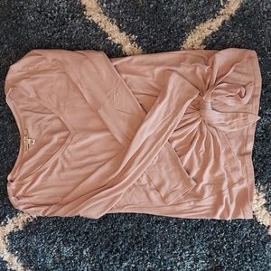 Long sleeve shirt,  tie detail at the waist,  pale pink color